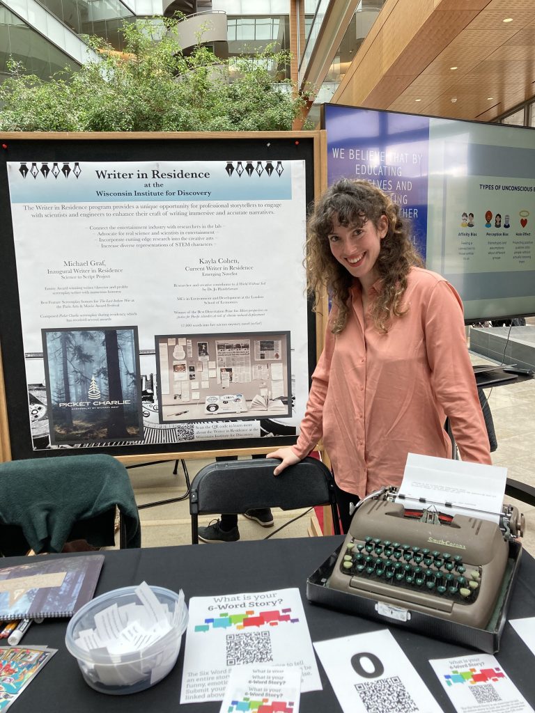 Kayla Cohen at the Writer in Residence Booth at Illuminating Connections